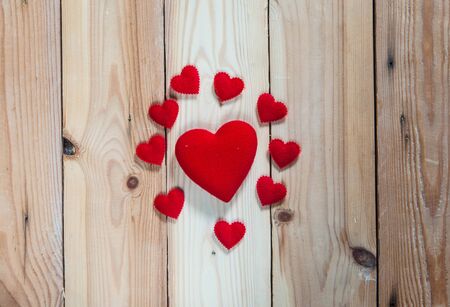 Heart on wooden background,selective focus.の写真素材