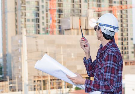 Engineer working at building site,soft focus.の写真素材