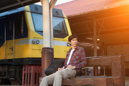 Man in train station waiting to travel,selective focus.の写真素材