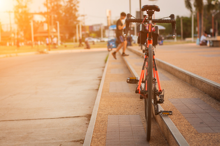 Bicycle in park at sunset/ sunrise,soft focus.の写真素材