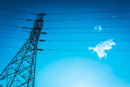 High voltage pole at sunset,selective focus.