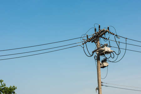 High voltage pole at sunset,selective focus.の写真素材