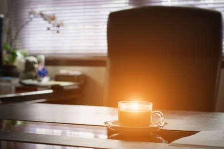 Coffee on desk in office,selective focus.の写真素材