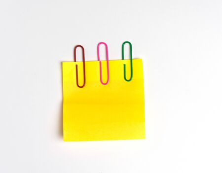 Clip paper and paper note on white background.の写真素材
