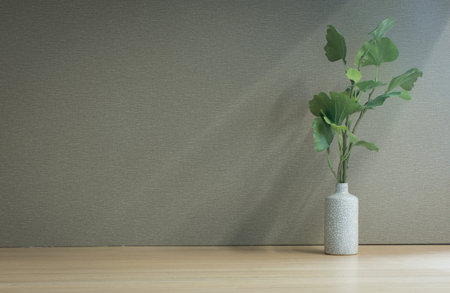 Fake tree on table in room,with copy space.