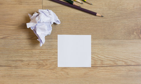 Paper on wooden desk.の写真素材