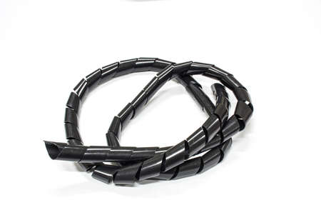 Black wire for strap on white background.の写真素材
