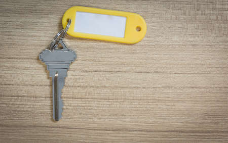 Key on wooden table with copy space.の写真素材