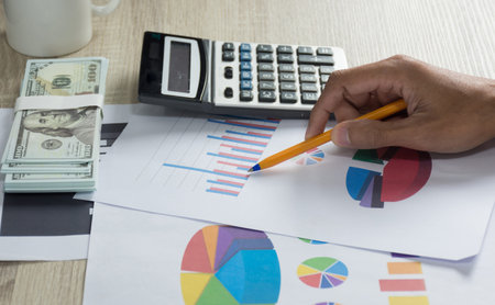 Business man working on desk with tool,finance accounting concept,selective focus.の写真素材