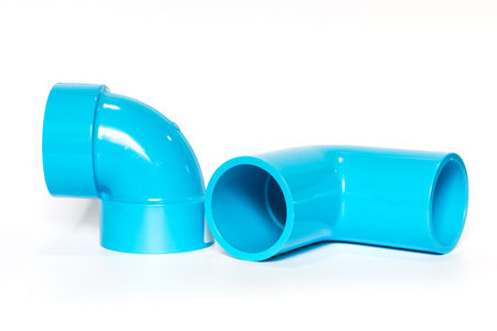 PVC pipe fitting connection on white background.