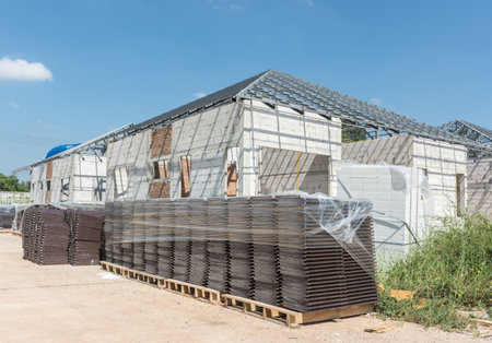 Stack of new roof tile on fall  before install on home,selective focus.の写真素材