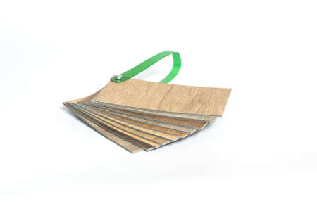 Stack of sample PVC vinyl wood planks on white background.の写真素材