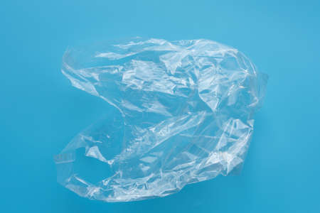 Clear plastic bag on blue background,environment concept.の写真素材