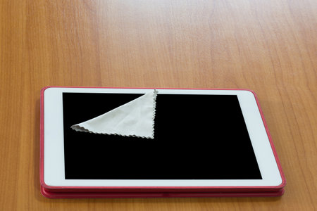 Small microfiber cloth for cleaning on tablet,selective focus.の写真素材