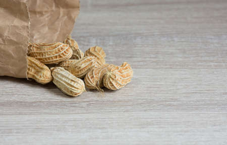 Group of peanut on wooden table background,copy space.の写真素材