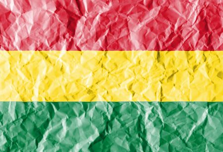 flag painted on crumpled paper background.の写真素材