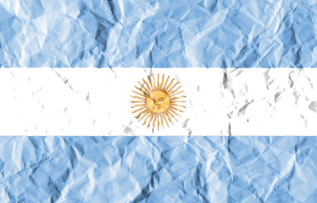 flag painted on crumpled paper background.の写真素材