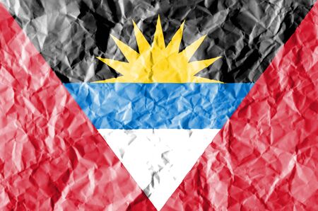 flag painted on crumpled paper background.の写真素材