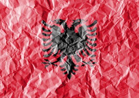 flag painted on crumpled paper background.の写真素材