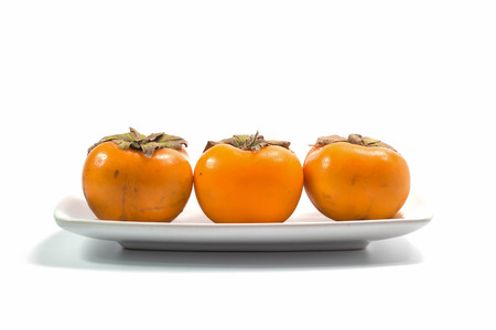 Persimmon fruit on white backgroundの写真素材