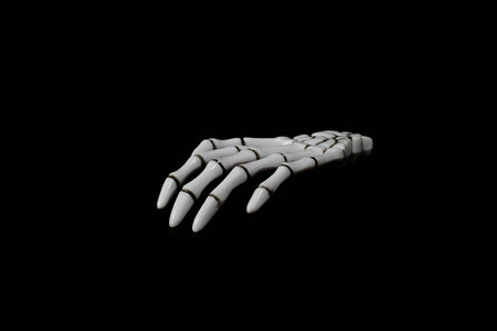 bone hand on black background.の写真素材