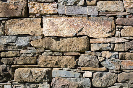 Masonry stone wall of an old house.の写真素材
