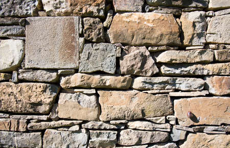 Masonry stone wall of an old house.の写真素材