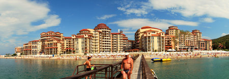 Sunny beach, Bulgaria - June 13, 2011: A man is walking on a quay at the bay of Sunny beach in Bulgaria.のeditorial素材
