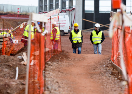 Sofia, Bulgaria - November 24, 2014: Engineers are walking at a construction site of a new waste plant near Sofia.のeditorial素材