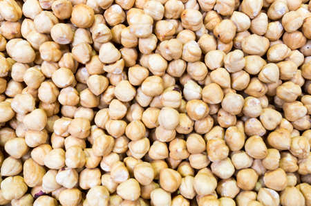 Many hazelnuts prepared for selling at a Turkish market street.の写真素材