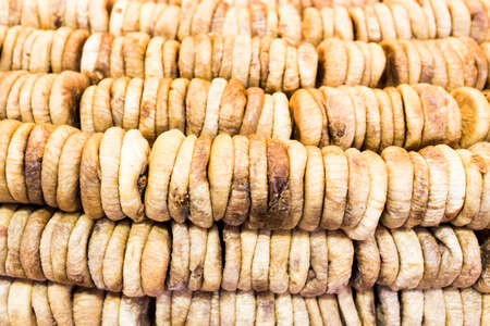 Dried figs prepared for selling at a Turkish market street.の写真素材