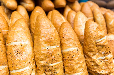 French bread prepared for selling at a Turkish market street.の写真素材