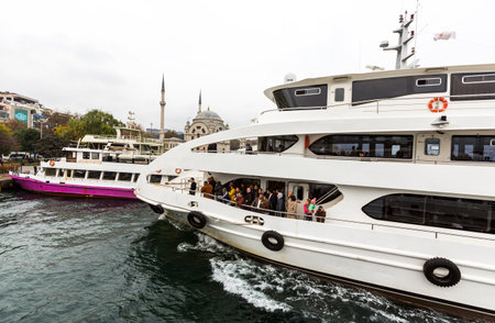 Istanbul, Turkey - November 14, 2014: Tourists are participating on a boat trip at the Bosphorus.のeditorial素材