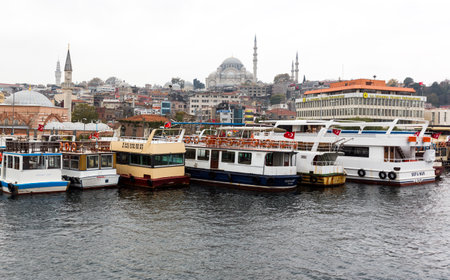 Istanbul, Turkey - November 15, 2014: Boats for a boat trip for tourists at the Bosphorus.のeditorial素材