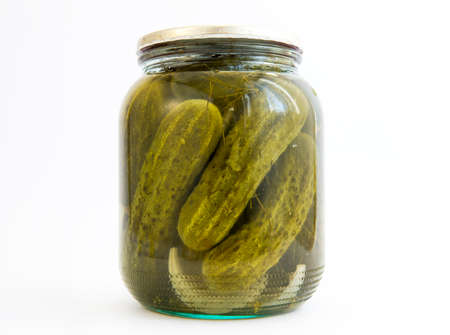 Pickles in a jar isolated on white.の写真素材