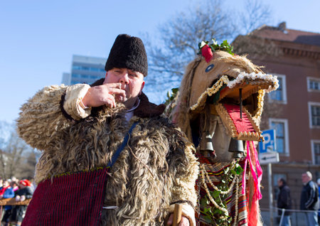 Pernik, Bulgaria - January 31, 2015: Participants are participating in the International Festival of Masquerade Games Surva. The festival promotes variations of ancient Bulgarian and foreign customs and masks that are still alive today.のeditorial素材