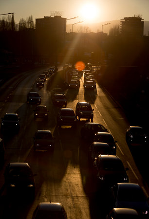Sofia, Bulgaria - February 17, 2015: People are traveling by cars at rush hour at one of the busiest boulevard in Sofia. Bulgaria's capital has the most polluted air in the EU.のeditorial素材