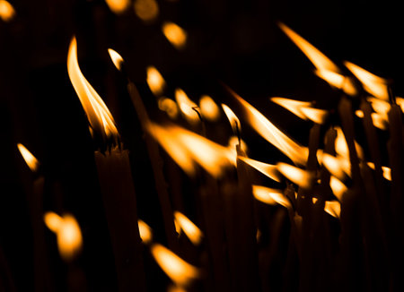 Church candles with a background bokeh at Easter.の写真素材