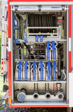 Sofia, Bulgaria - May 19, 2015: Hoses in fire truck are seen while teams from Fire department are participating in an emergency training with spilled toxic and flammable materials.のeditorial素材