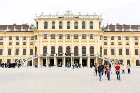 Vienna, Austria - May 1, 2015: Tourists are visiting the former imperial summer residence known as Schonbrunn Palace.のeditorial素材