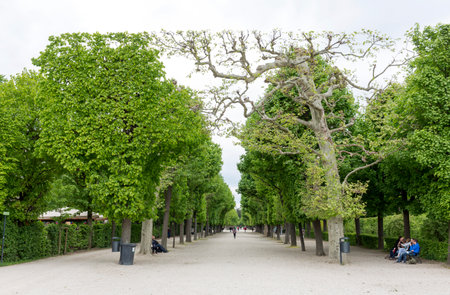 Vienna, Austria - May 1, 2015: Tourists are visiting the former imperial summer residence known as Schonbrunn Palace.のeditorial素材
