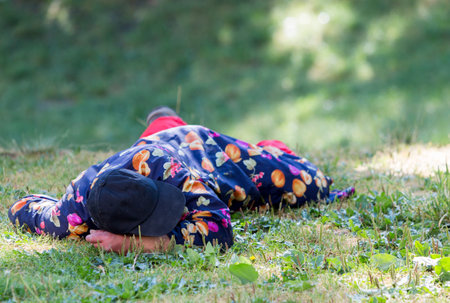 A homeless man is sleeping on a meadow in the center of Sofia. Years after joining the EU Bulgaria...