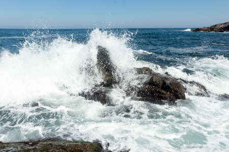 Water of Black sea crushes in the rocks of Sozopol's shore.の写真素材