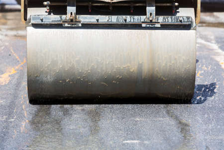 Heavy Vibration roller compactor at asphalt pavement works for road repairingの写真素材