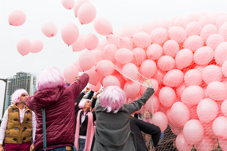 Sofia, Bulgaria - October 19, 2015: People are releasing more than a thousand pink balloons in memory of every woman died from breast cancer last year.のeditorial素材
