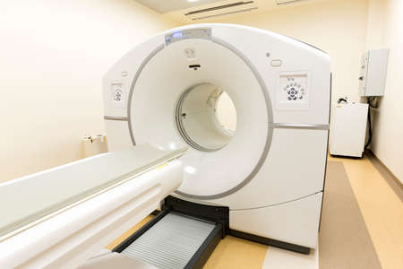 A CT scan, also called X-ray computed tomography (X-ray CT) or computerized axial tomography scan (CAT scan) in a new modern cancer treatment hospital.の写真素材