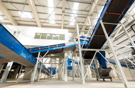 Inside of a new modern biomass waste plant. As an energy source, biomass is used directly via combustion to produce heat and indirectly after converting it to various forms of biofuel.のeditorial素材