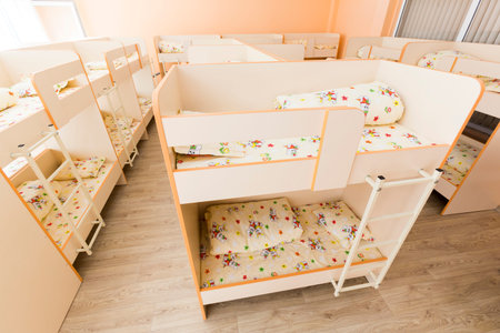New kindergarten bedroom with small bunk beds with stairs for the kids.