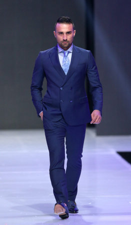 Sofia, Bulgaria - March 23, 2016: A male model walks the runway during the 2016 Sofia Fashion Week Show in Sofia, Bulgaria.のeditorial素材