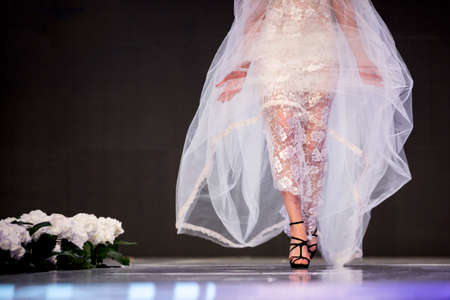 A female model walks the runway with a wedding dress during the 2016 Fashion Week Showの写真素材